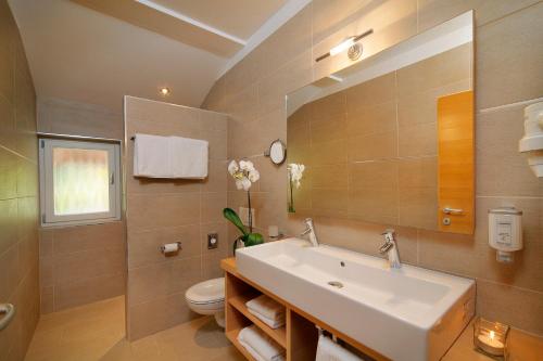 Ένα μπάνιο στο Apartments Oberdorner
