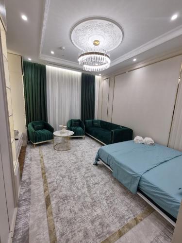 Postel nebo postele na pokoji v ubytování Tashkent Nest one