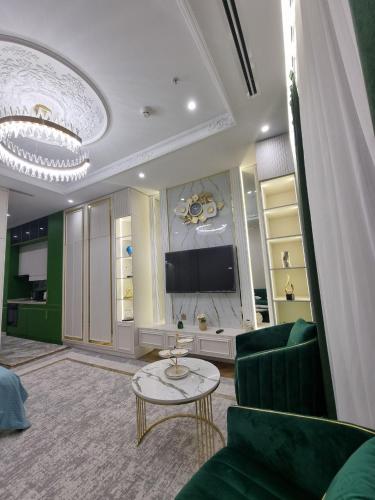 TV a/nebo společenská místnost v ubytování Tashkent Nest one