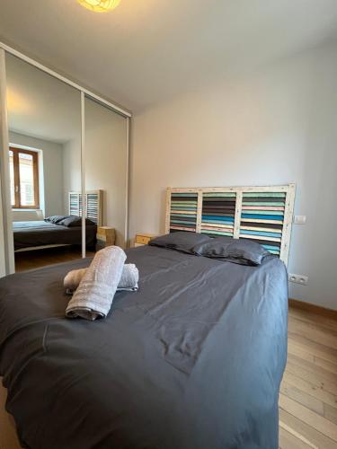 En eller flere senge i et værelse på Au cœur de Paray- Quartier historique