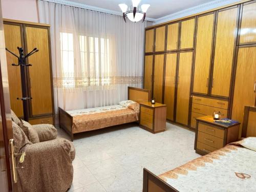 En eller flere senger på et rom på Yoga Guesthouse
