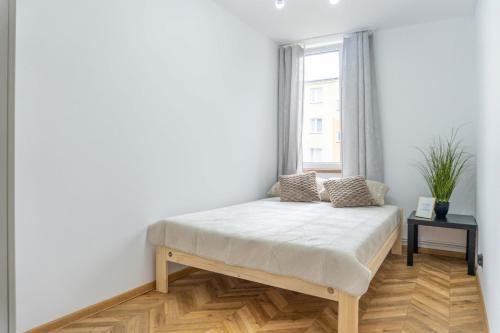Кровать или кровати в номере Przytulny apartament 2 pokojowy ma Wójtostwie