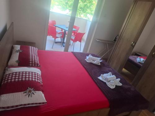Ліжко або ліжка в номері Apartman Vuković