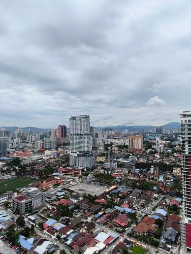 an aerial view of a city with tall buildings at Summer Suites KLCC by CozyNest in Kuala Lumpur