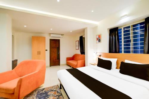 Katil atau katil-katil dalam bilik di Super Townhouse Casa Grand Miyapur