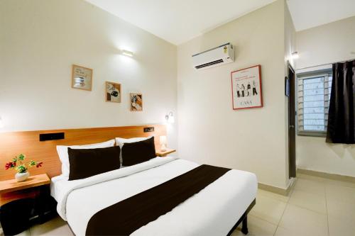Katil atau katil-katil dalam bilik di Super Townhouse Casa Grand Miyapur