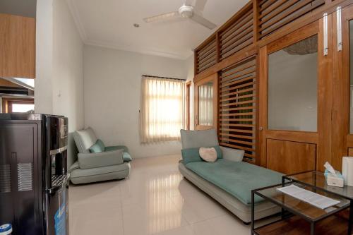Posezení v ubytování Cozy 2 bedrooms house in Jepara