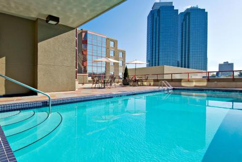 a large swimming pool on top of a building at Holiday Inn Express Vancouver-Metrotown (Burnaby) in Burnaby