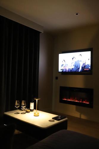 House 15にあるテレビまたはエンターテインメントセンター