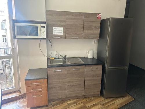 Η κουζίνα ή μικρή κουζίνα στο Loftel v centru Ostravy