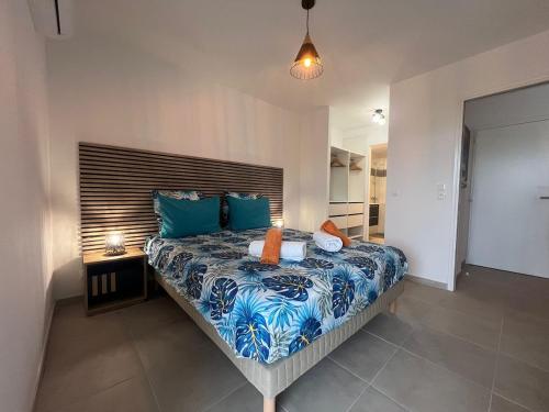 Ένα ή περισσότερα κρεβάτια σε δωμάτιο στο BnB MARTINIQUE, sejour Caraibes en 1ere ligne, marina Fort de France