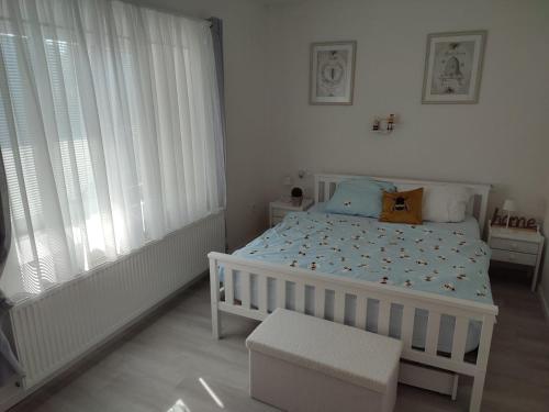 Postel nebo postele na pokoji v ubytování Apartmán U včelína