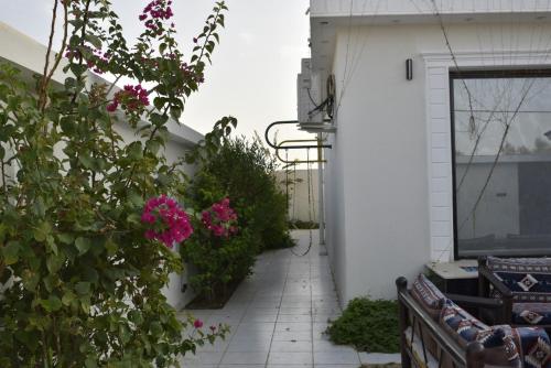 Сад в شاليهات فلاور - flower villas