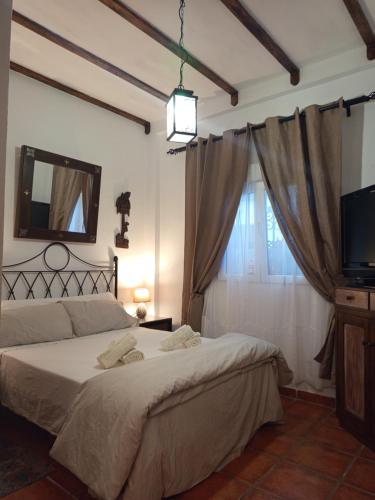 Postel nebo postele na pokoji v ubytování Apto CENTRO HISTORICO MEDIEVAL