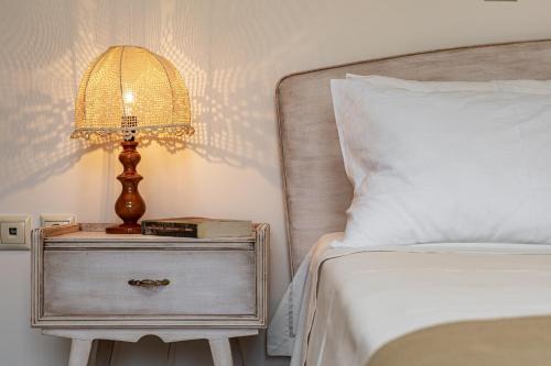 Ένα ή περισσότερα κρεβάτια σε δωμάτιο στο Happy and cozy apartment in Kiato