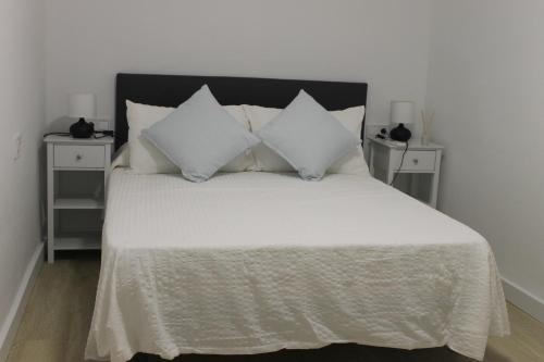 Ένα ή περισσότερα κρεβάτια σε δωμάτιο στο Astein Luxury