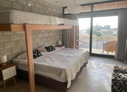 Postel nebo postele na pokoji v ubytování Vichayito Casa Wiñay