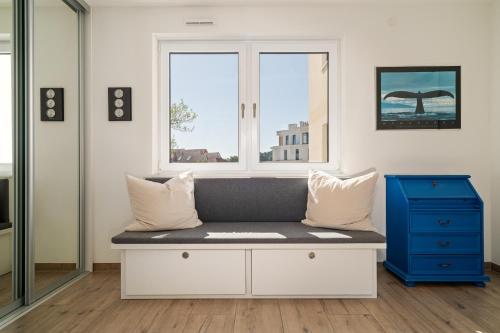 Zona de estar de Müritz Utkiek - Apartment mit Seeblick & Balkon in der Hafenresidenz