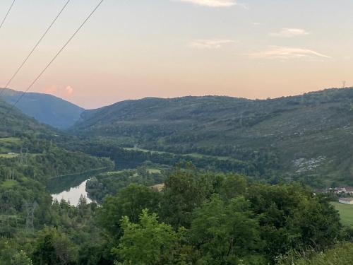 a view of a river in a valley at Chambre le Faucon in Cernon