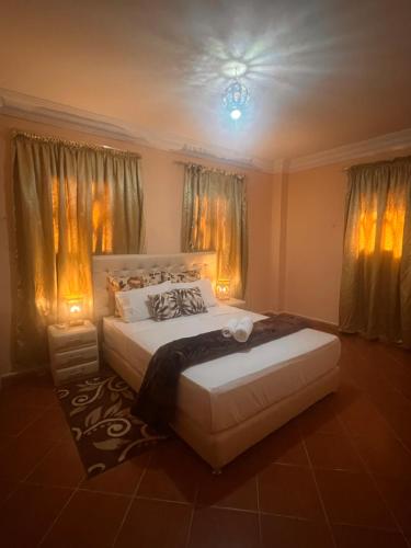 Una cama o camas en una habitación de Hotel Ourida Zagora