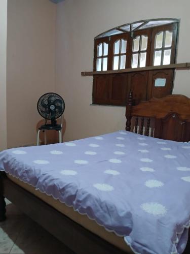 Кровать или кровати в номере Casa em Ananindeua