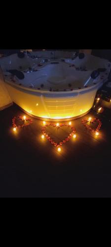 a bowl with lights on the floor in a room at Viagio hoteL in Yerevan