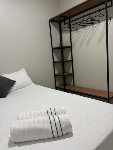 Katil atau katil-katil dalam bilik di Residencial Magalhães