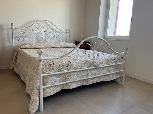 Postel nebo postele na pokoji v ubytování Agriturismo Corte Bonetti - Appartamento i Cipressi