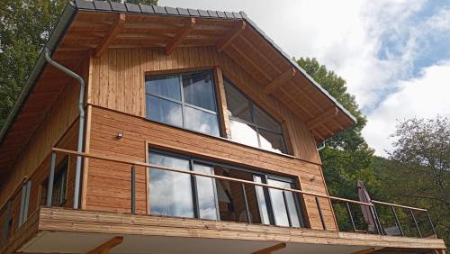 a house with a large window on top of it at Chalet vue panoramique in Fillinges