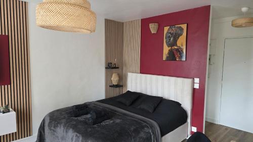 O zonă de relaxare la L'Ethnik Spot- studio cosy proche Paris et Stade de France - parking privé
