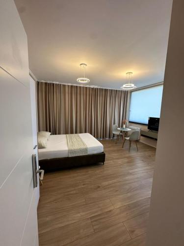 Postel nebo postele na pokoji v ubytování Air B&B Hotel