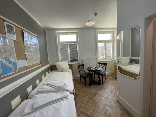 Katil atau katil-katil dalam bilik di HOTEL Bahnhof Balingen