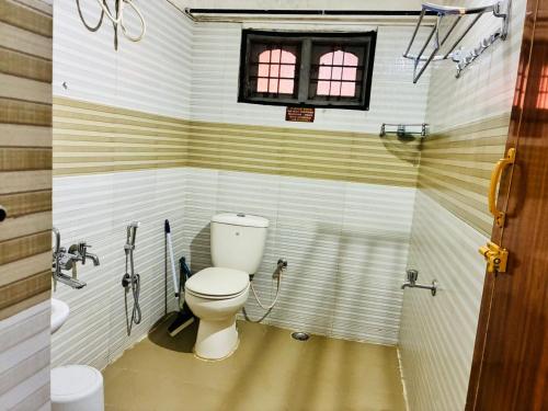 Ένα μπάνιο στο Coorg TR get homes