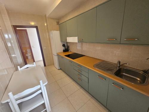 Kuchyň nebo kuchyňský kout v ubytování Amazing ocean view apartment