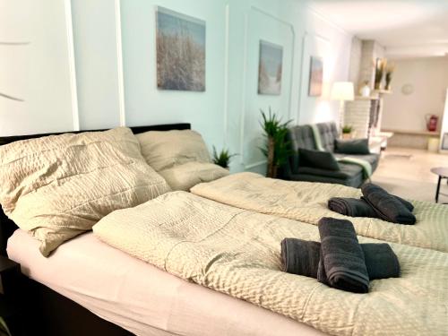 Ένα ή περισσότερα κρεβάτια σε δωμάτιο στο UNO POOL Apartment
