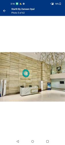 a picture of a room with a wall at Elevate Your Living Experience in zameen Opal Apartments in Lahore