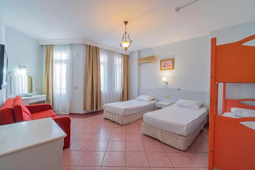 Кровать или кровати в номере Bahama Beach Konaklı