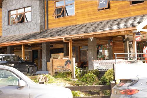 a building with cars parked in front of it at Casa Magdalena ideal para Familias in Puerto Varas