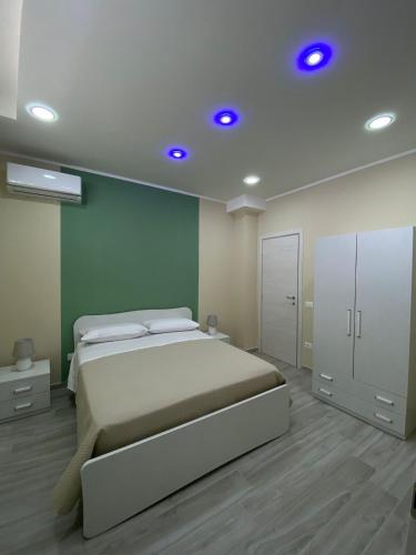 Giường trong phòng chung tại B&B Costa d'Amalfi Bellizzi