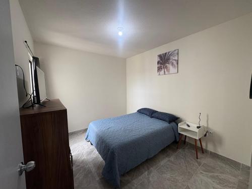 Postel nebo postele na pokoji v ubytování Apartamento Familiar Céntrico