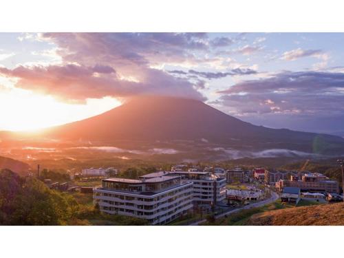 a view of a mountain in front of a city at Skye Niseko - Vacation STAY 30752v in Niseko