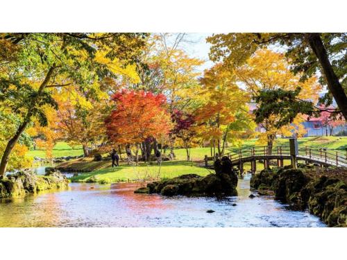 a painting of a pond in a park with trees at Skye Niseko - Vacation STAY 41529v in Niseko