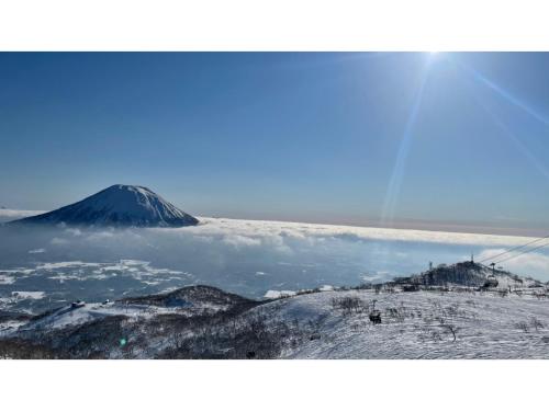 a view of a mountain in the sky with a snow covered at Skye Niseko - Vacation STAY 70567v in Niseko