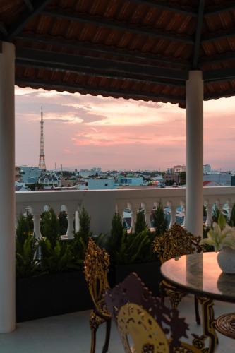 a view of the eiffel tower from the balcony of a house at Homestay Song Ngọc in Ấp Sung Xuân