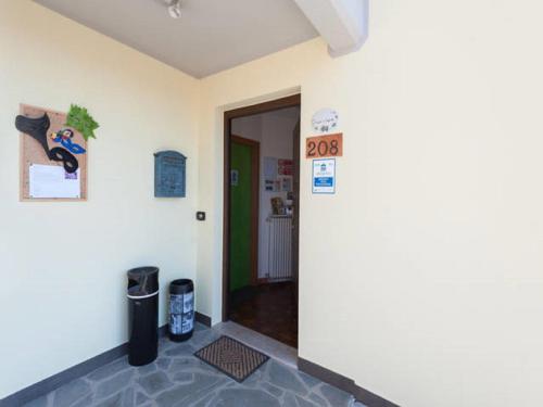 a hallway with a door to a room at Tolasudolsa Rooms, Breakfast & Mountain Bike in Compiano