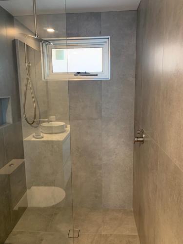 Ένα μπάνιο στο Guest house - Ocean views