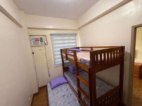 Postel nebo postele na pokoji v ubytování Manggahan General Trias Cavite