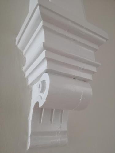 a white coffered ceiling in a room at Ah33 - Estúdios in Coimbra