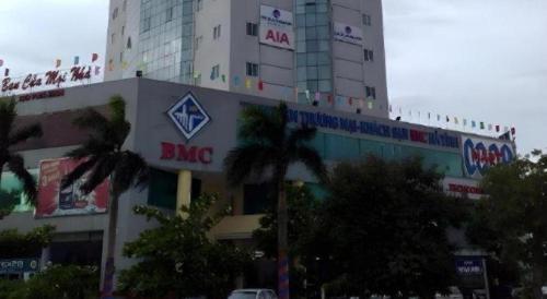 a large building with a bing sign on it at BMC Ha Tinh hotel in Ha Tinh