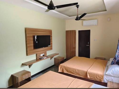 Postel nebo postele na pokoji v ubytování MOUNT OASIS tvm